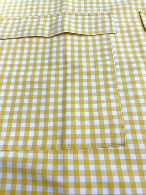 洗濯した際一緒に洗ってしまったボールペンのインクが染みになってしまった白と黄色いチェックのエプロンの染みがキレイに落ちた染み抜きクリーニング事例(５，５００円税込)2026.02.10